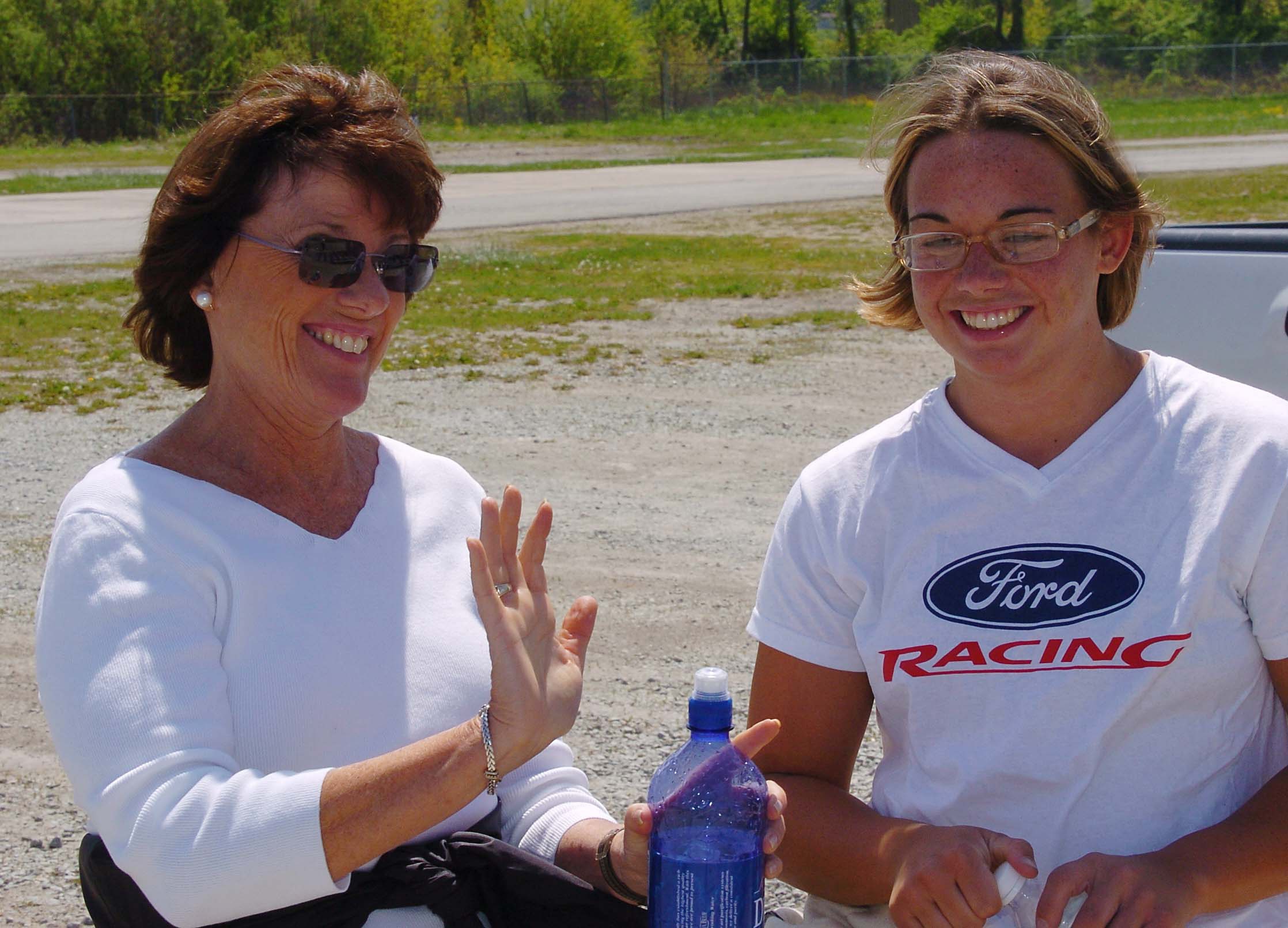 Racing legend Lyn St. James (left) and driver Lynsey Tilton (right) chat during Ford Racing's women driver evaluation at Anderson Speedway.